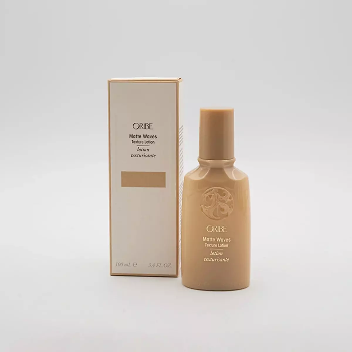 Текстурирующий бальзам для волос с волнистым эффектом Oribe Matte Waves Texture Lotion