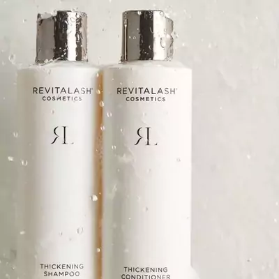 Шампунь с формулой ухода за кожей головы и увеличение объема Revitalash Thickening Shampoo