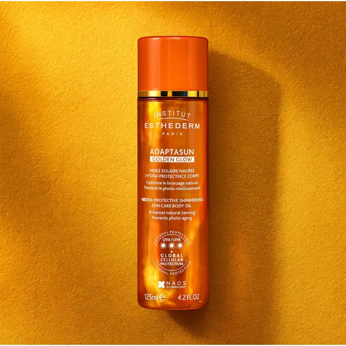 Защитное масло с шимером Institut Esthederm Adaptasun Golden Glow Hydra-Protective Shimmering Sun Care Body Oil
