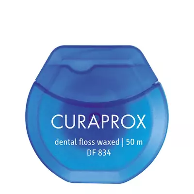 Нитка міжзубна вощена з ароматом м`яти Curaprox DF 834 50 m
